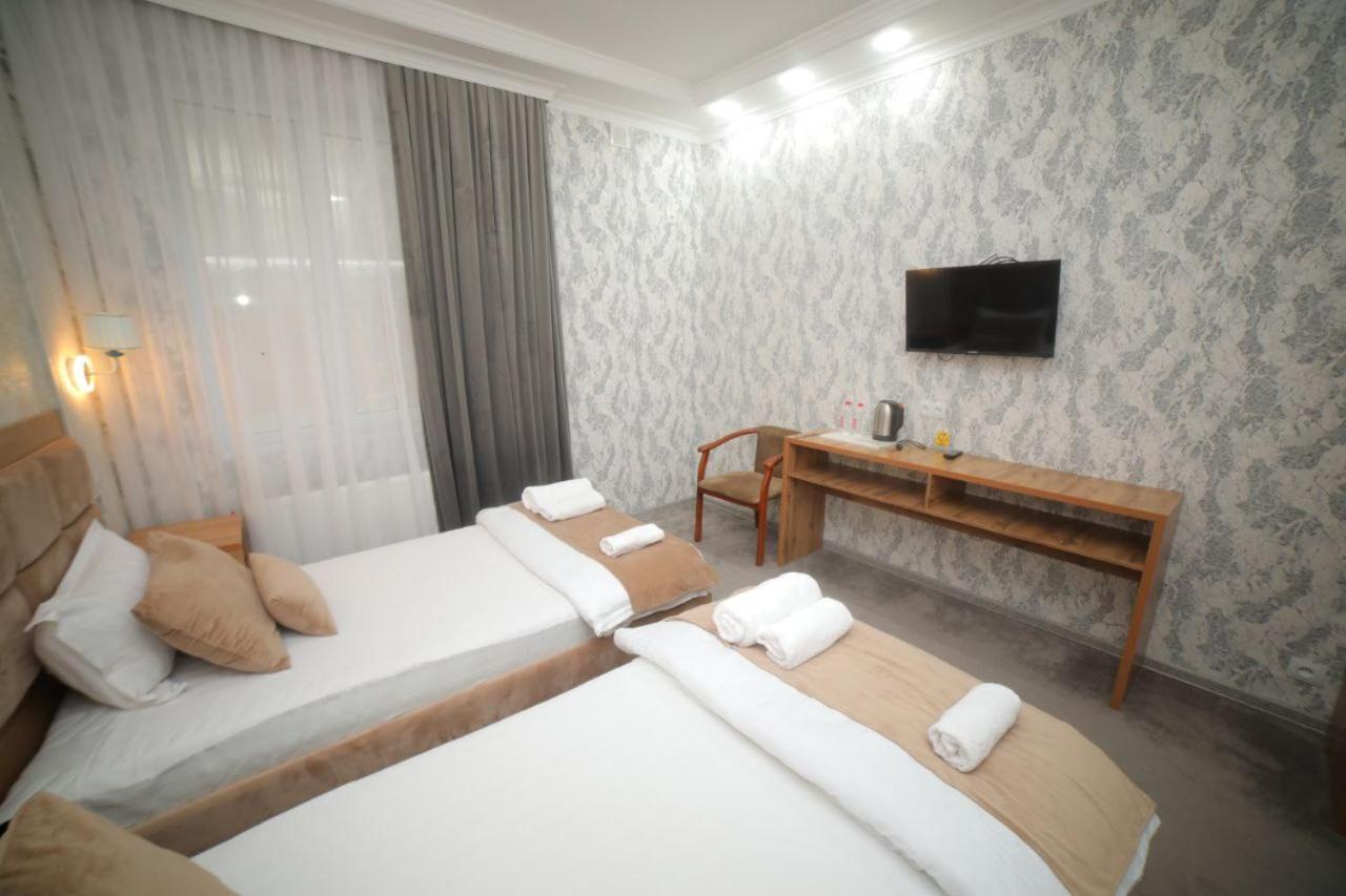 Hotel Tinchlik Plaza Yrgench Exterior foto